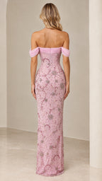 Back view of model in dusty rose off-the-shoulder sequined column gown