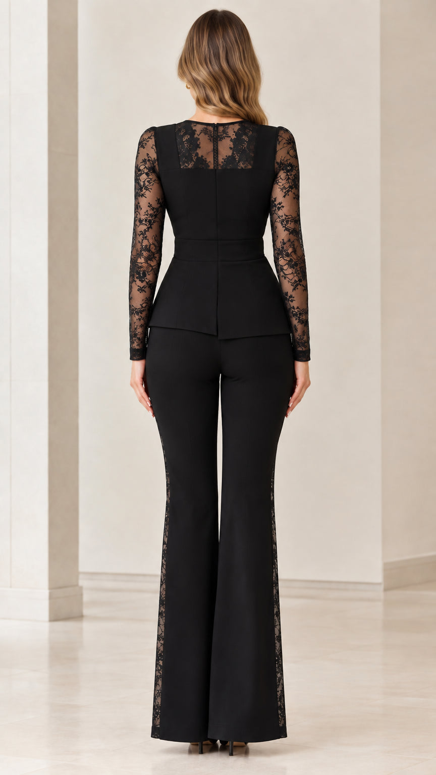 Back view of black two-piece pant suit highlighting sheer lace upper back