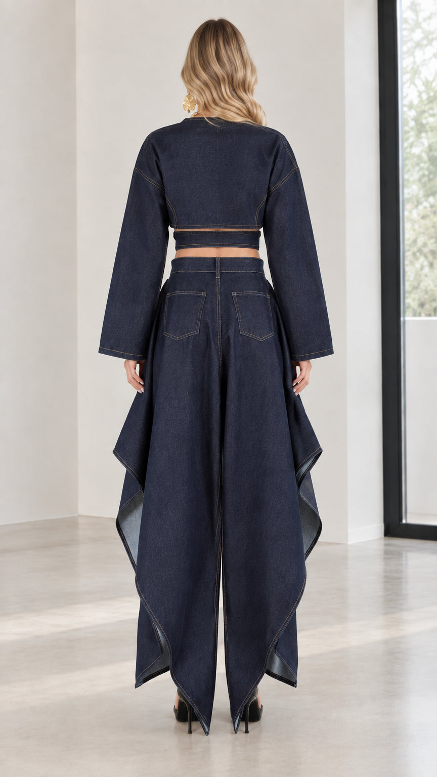 Back view of dark blue cropped long-sleeve top and high-waisted pants with back pockets