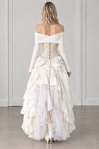 Back view of model wearing ivory off-shoulder corset tiered maxi dress