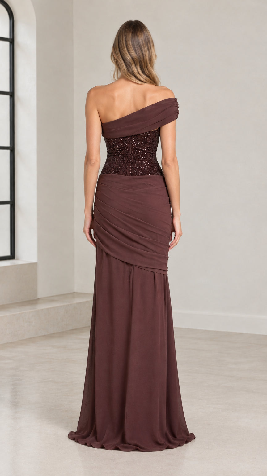 Back view of chocolate brown one-shoulder draped sequin evening dress