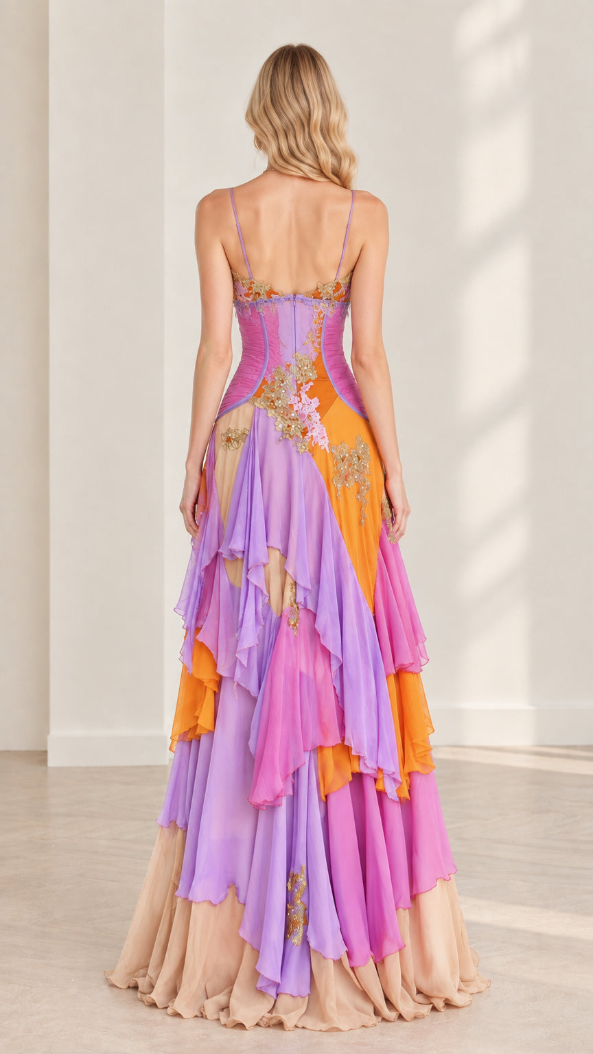 Back view of model wearing multicolor spaghetti strap tiered maxi gown