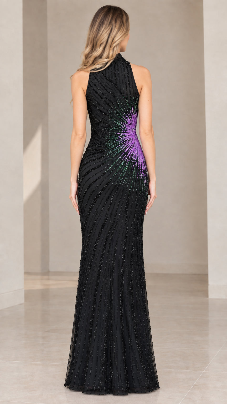 Back view of black halter neck floor-length beaded evening dress