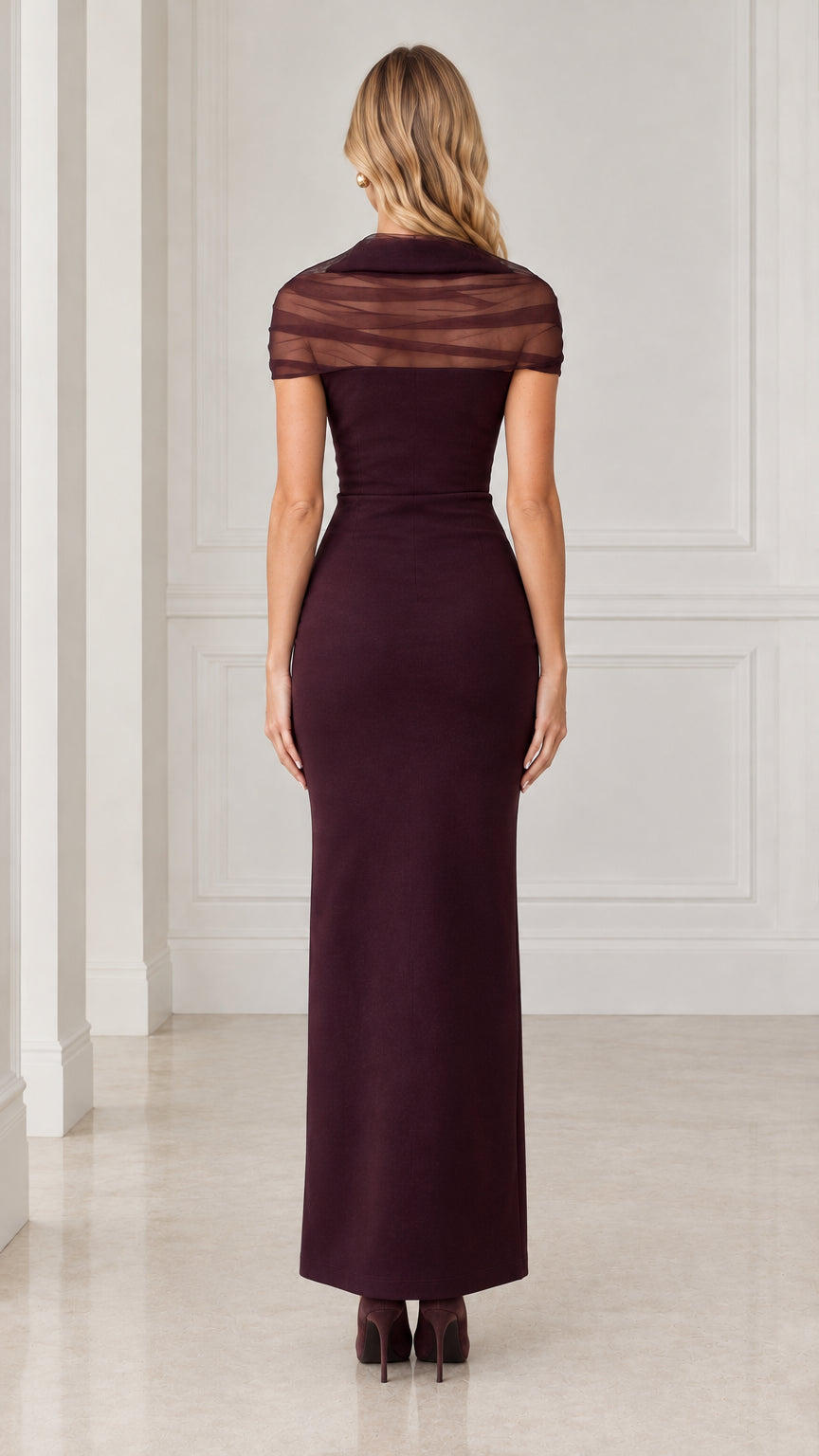 Back view of model wearing burgundy cowl neck evening gown with back zipper detail