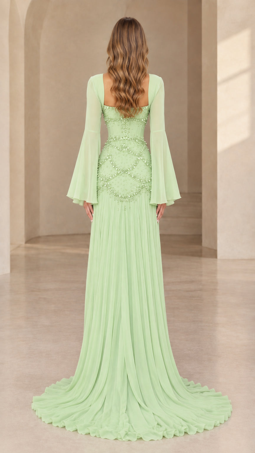 Mint green evening dress back view highlighting lace-up corset and sweeping train