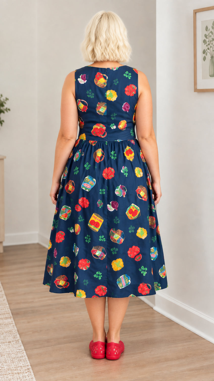 Back view of model showcasing Navy Blue sleeveless swing dress