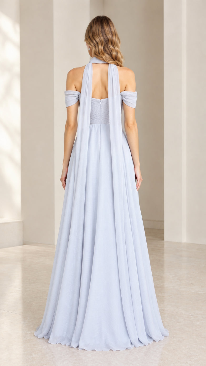Back view of light blue formal gown showing trailing back scarf streamers
