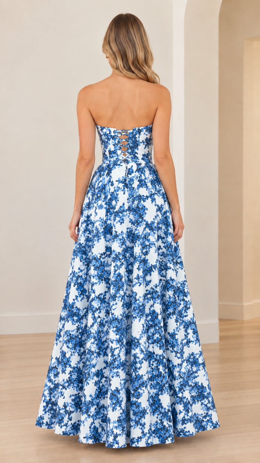 Back view of strapless blue and white floral ballgown featuring lace-up detail