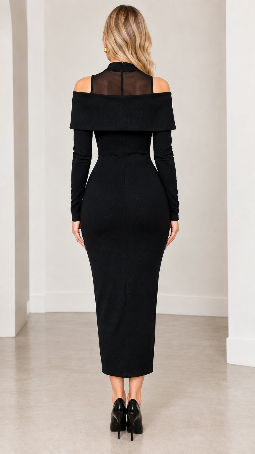 Back view of black bodycon midi dress showing sheer mesh upper yoke