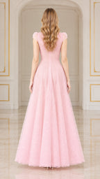 Back view of woman wearing pink lace maxi gown with cap sleeves