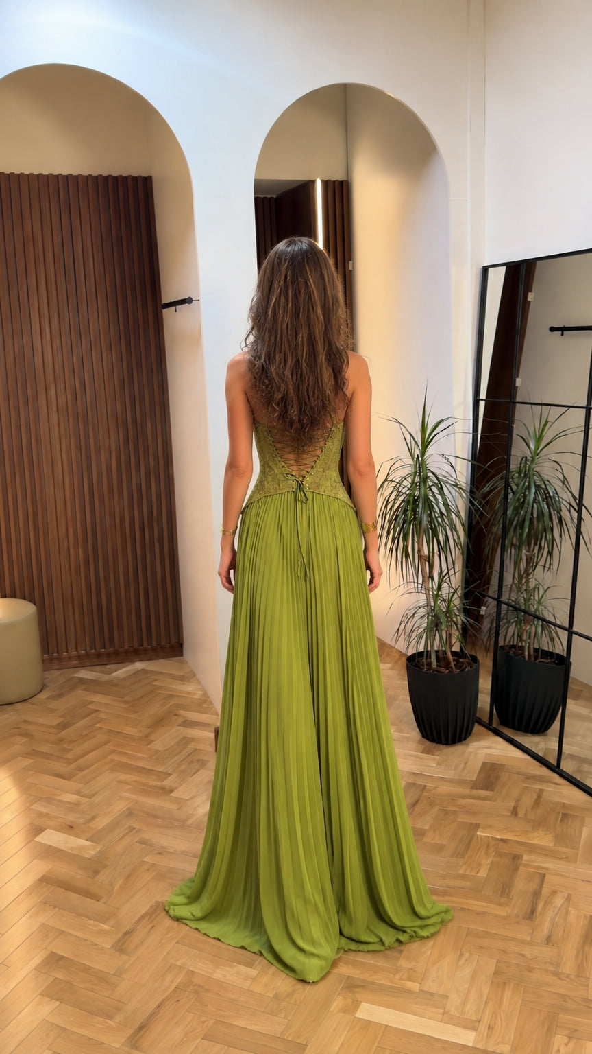 Back view of olive green evening dress showing adjustable lace-up corset back