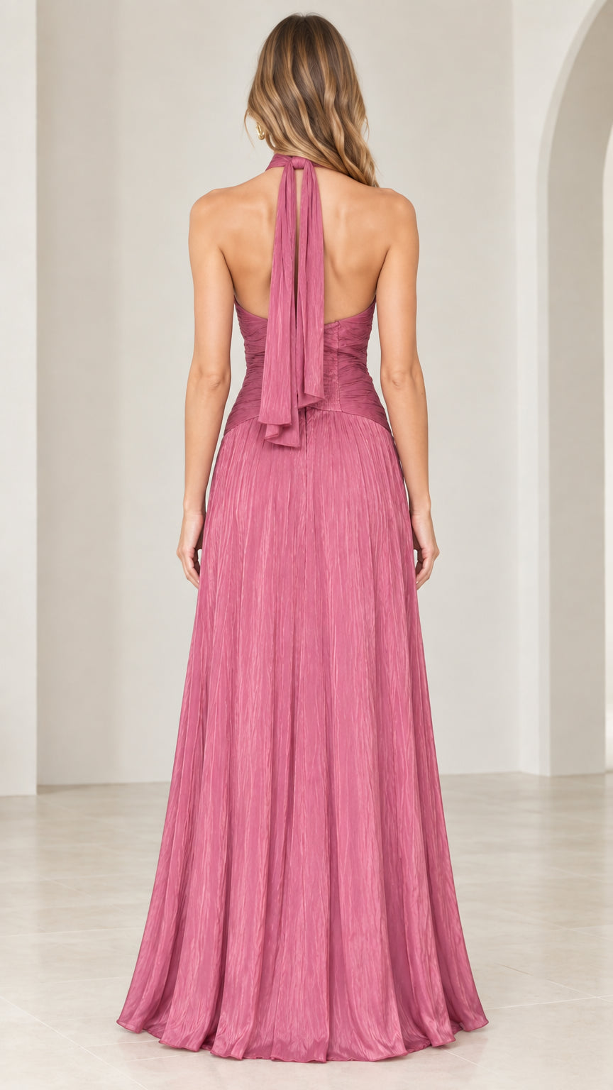 Full back view of the rose pink evening dress showing the open back design and draped halter tie
