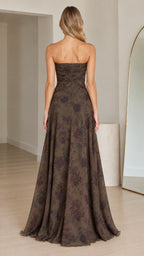 Back view of woman wearing olive green strapless floral maxi gown