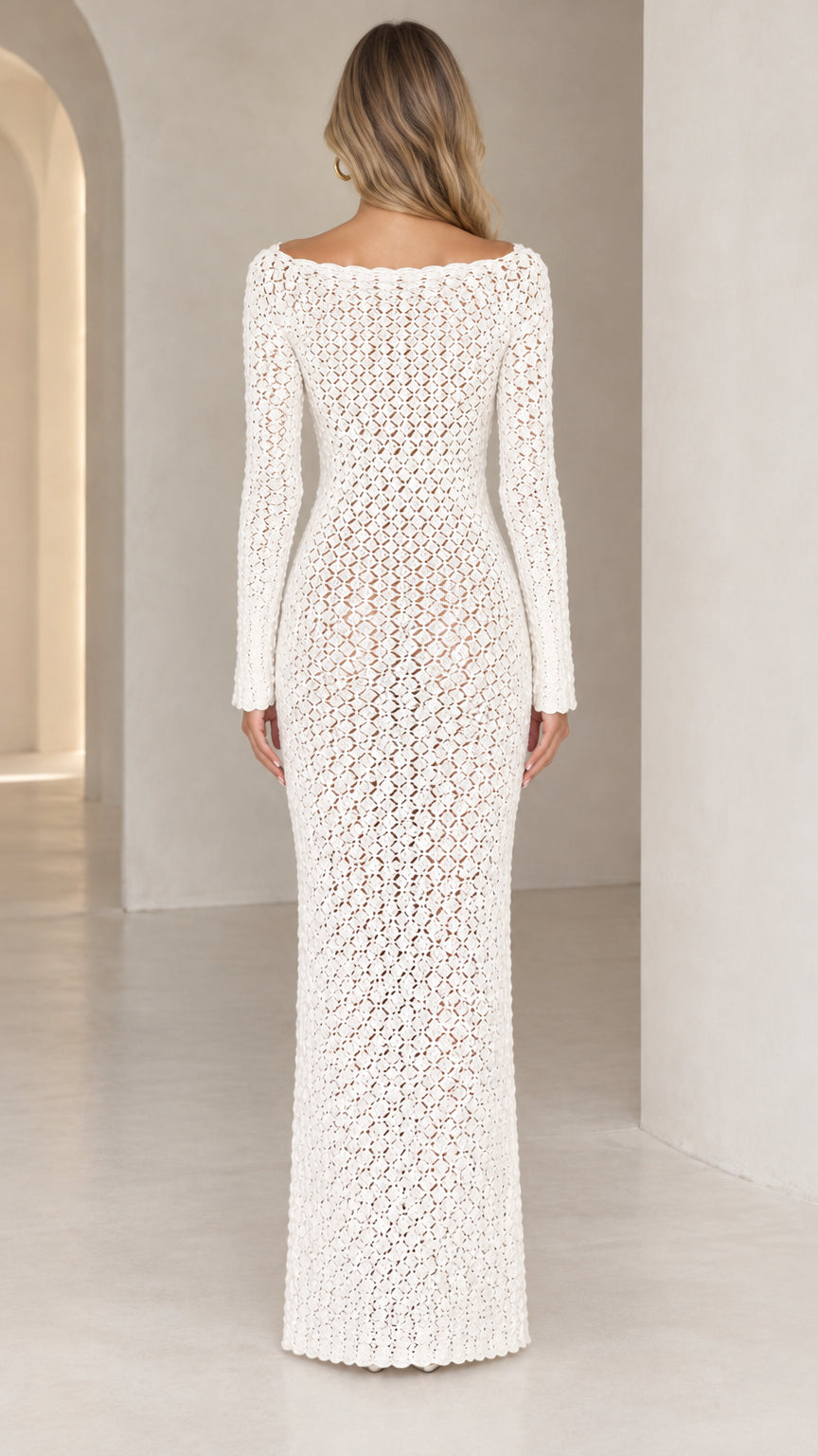 Back view of model wearing white openwork knit long sleeve maxi dress