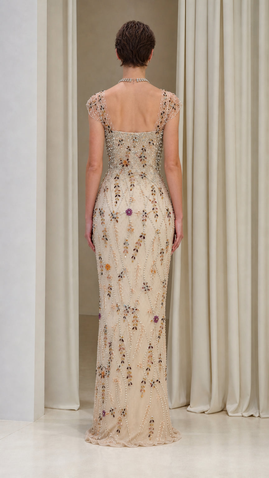 Champagne embellished cap-sleeve formal gown back view