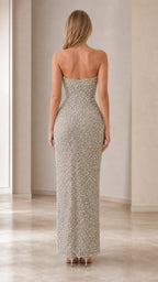 Back view of model wearing Champagne strapless sequin formal evening dress