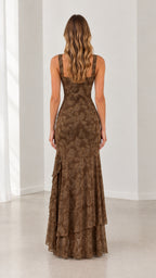 Back view of woman wearing brown square back floral jacquard evening gown