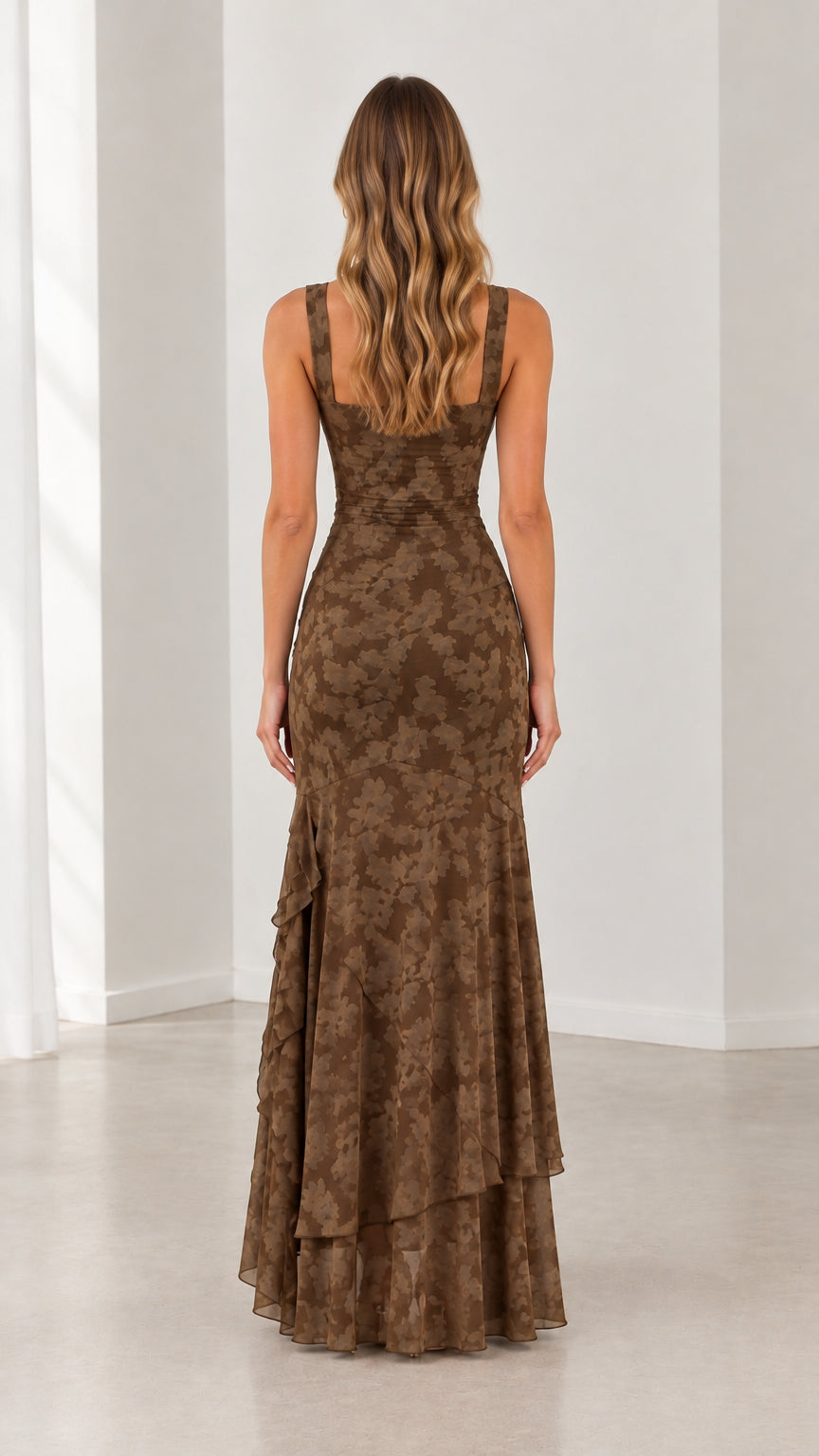 Back view of woman wearing brown square back floral jacquard evening gown