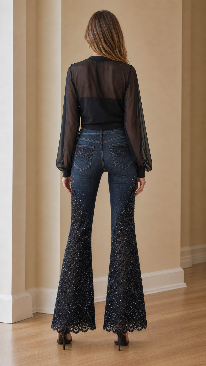 Back view of model wearing dark blue beaded bell bottom jeans