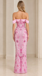 Back view of woman wearing pink strapless off-the-shoulder evening maxi dress