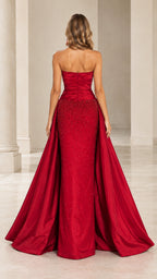 Back view of model showing the back zip and sweeping train of the red evening gown
