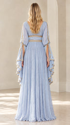 Back full-length view of Light Blue pleated maxi dress showing open bell sleeves