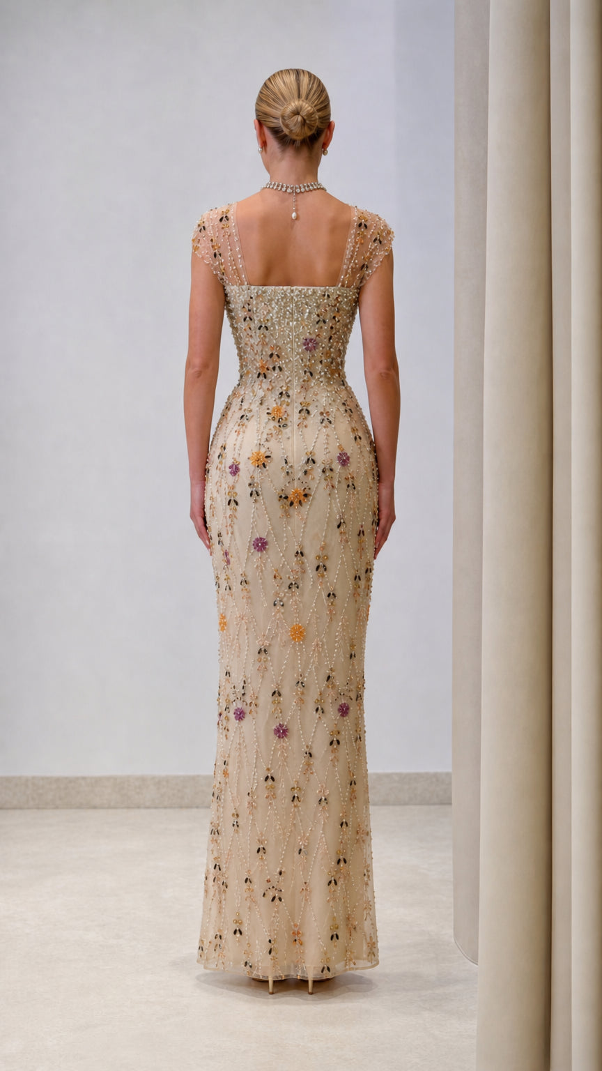 Champagne floral embroidered evening gown back view