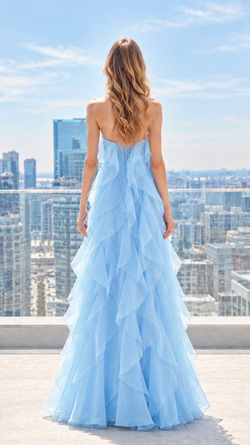 Back view of woman wearing light blue halter tiered ruffle maxi gown
