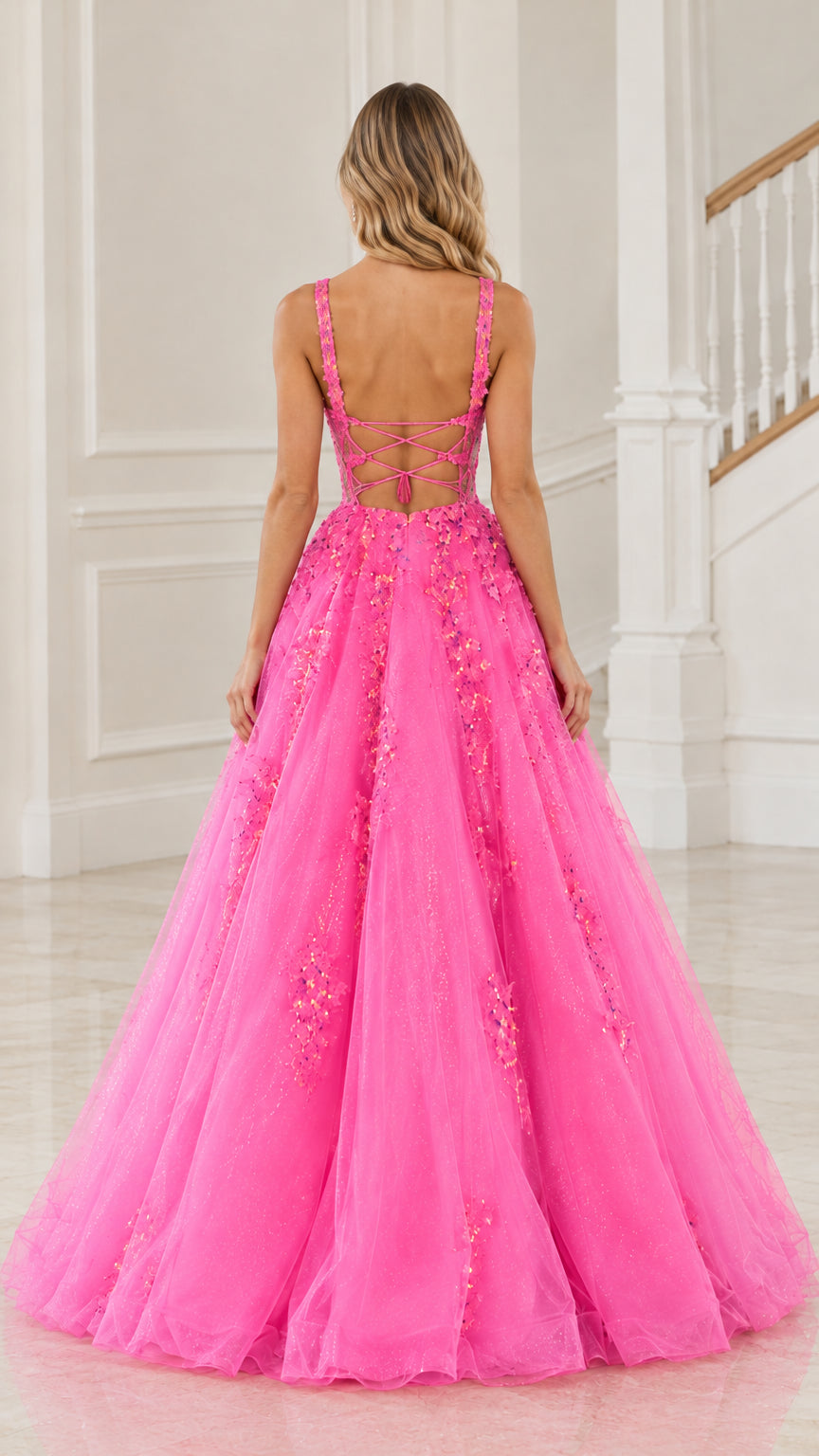 Back view of hot pink ball gown showing lace-up strappy back design