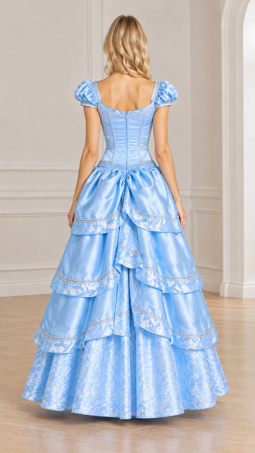Back view of light blue Victorian ball gown showing corset back and tiered skirt drape