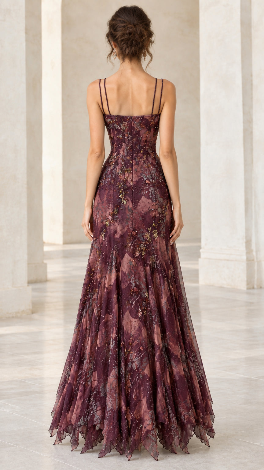 Back view of woman wearing the burgundy floral evening dress showing double spaghetti straps