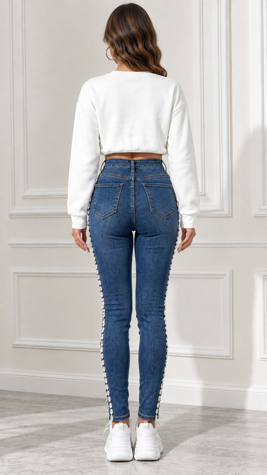 Back full-length view of pearl-embellished high-rise skinny jeans