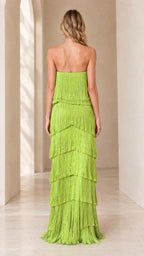 Back view of model in lime green strapless tiered fringe evening gown