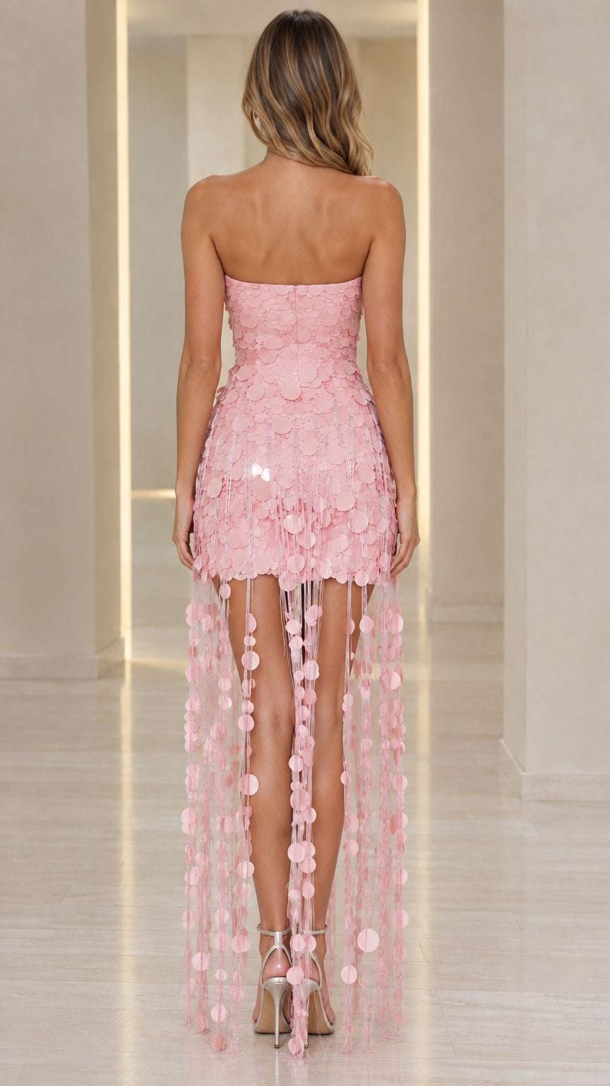 Back view of strapless sequin fringe maxi dress in pink
