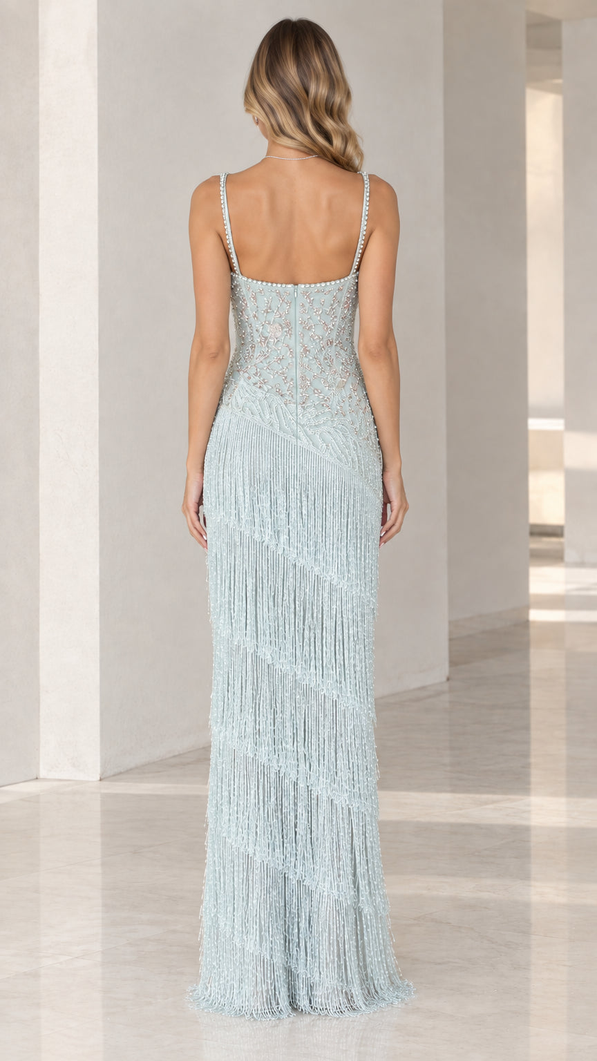 Back view of Ice Blue sweetheart evening gown with delicate straps