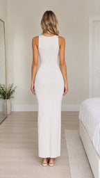 Back view of model wearing off-white fitted crew neck maxi dress