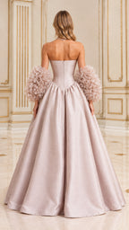 Back view of model wearing dusty pink basque waist formal gown with textured sleeve cuffs