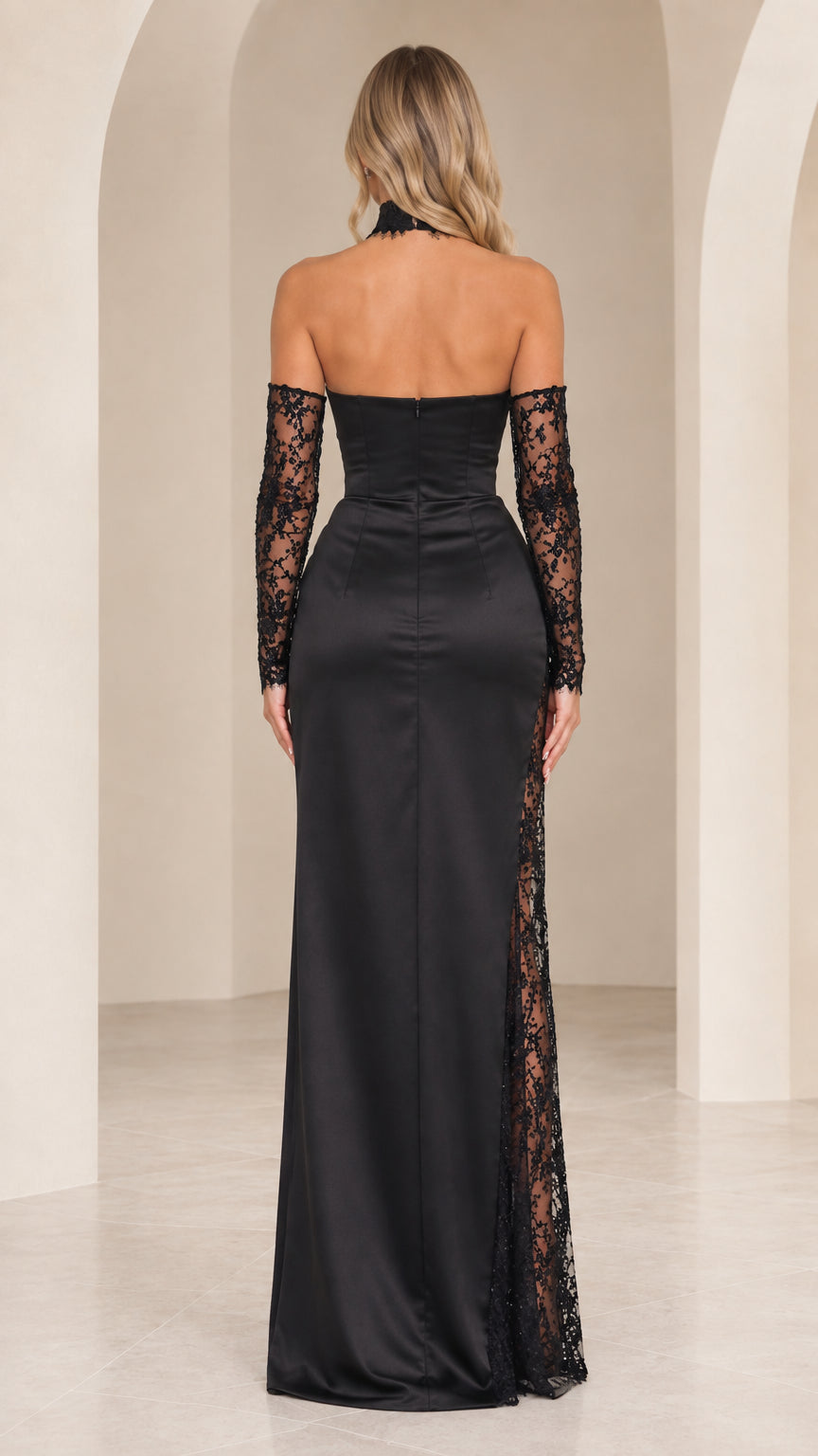 Back view of black strapless floor-length evening dress