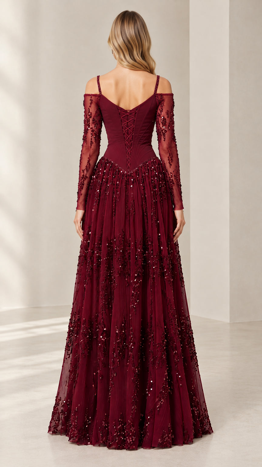Back view of burgundy corset evening dress showing lace-up back detail