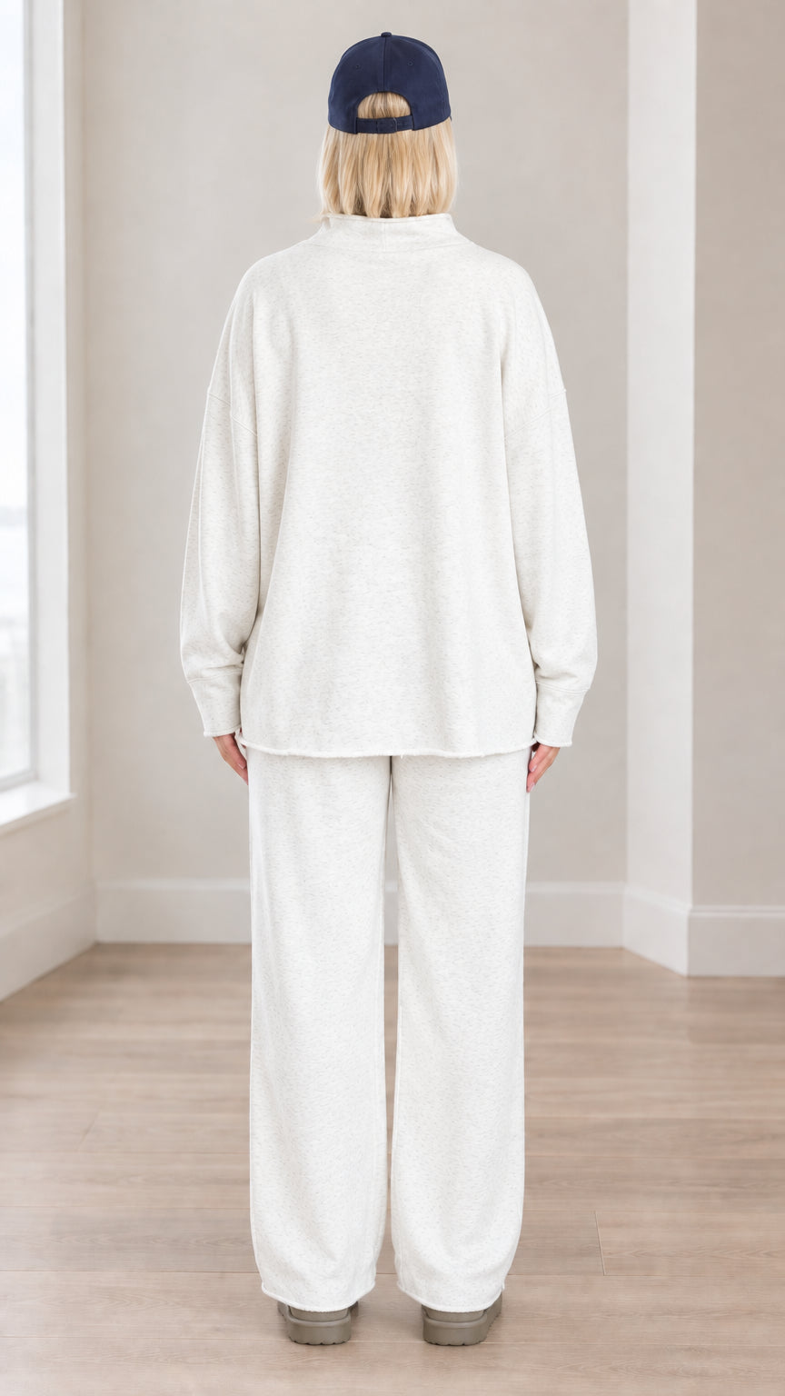 Back view of model wearing oatmeal relaxed-fit mock neck sweat set