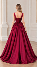 Back view of burgundy corset evening dress showing beaded lace-up detail