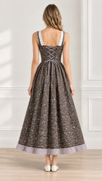 Back view of brown floral maxi dress showing back corset lacing