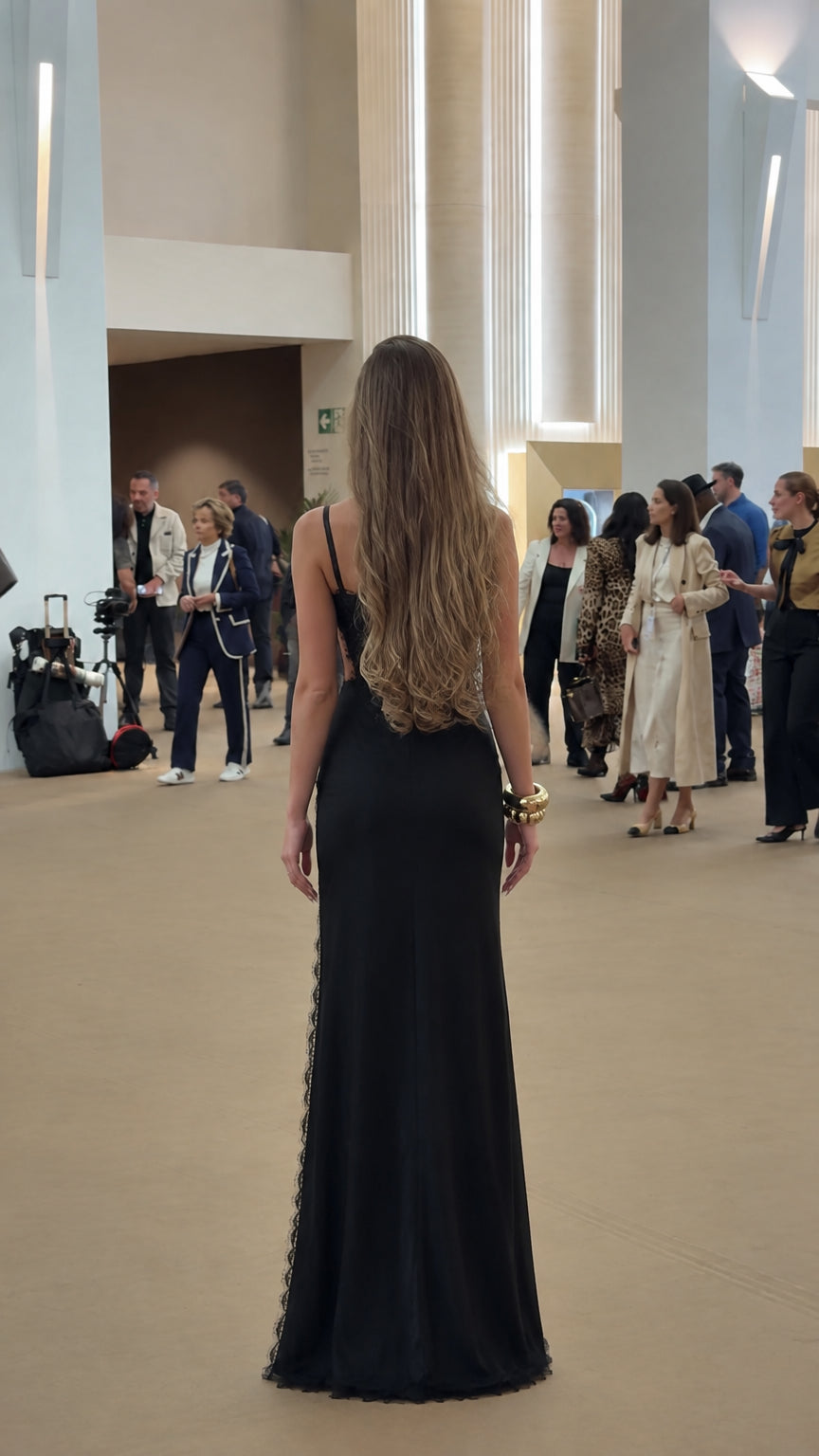 Back view of black satin slip dress with slender shoulder straps