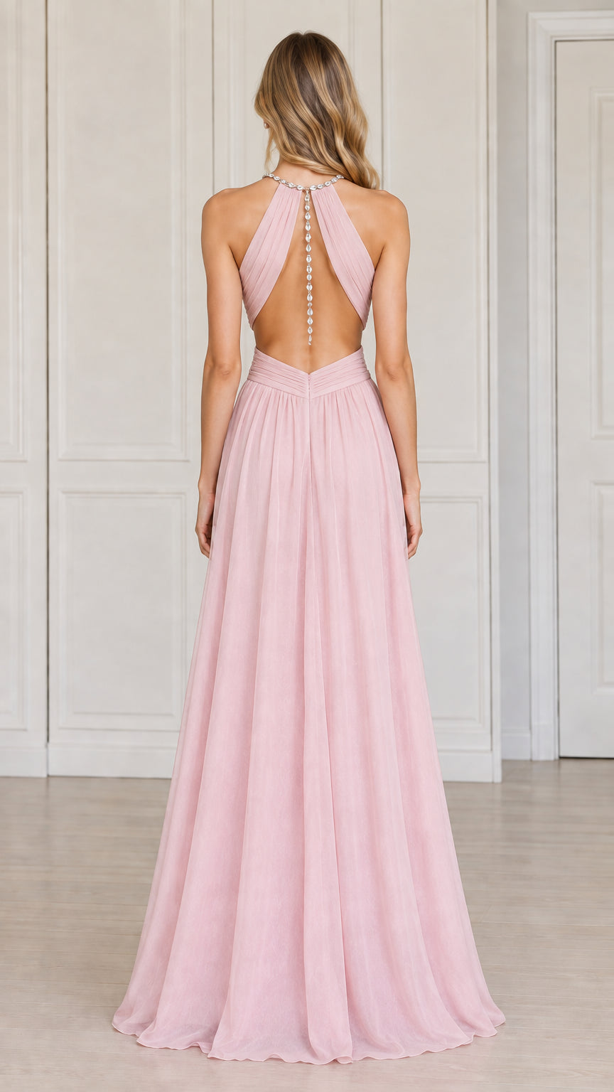 Back view of the blush pink halter evening dress highlighting open keyhole back and jewel chain