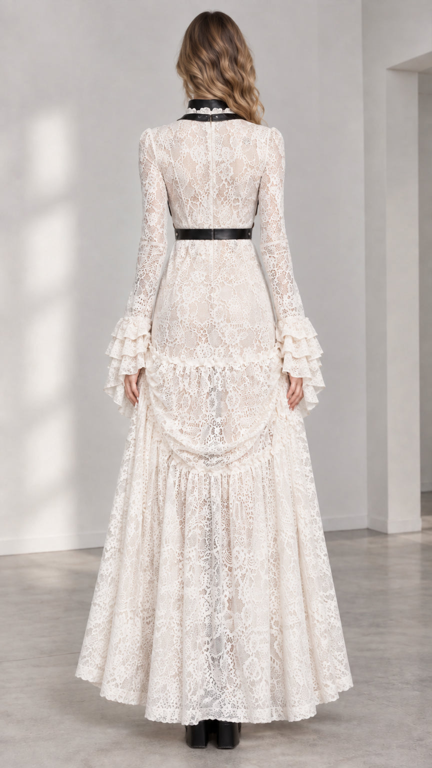 Back view of woman wearing Ivory lace maxi dress with harness detail