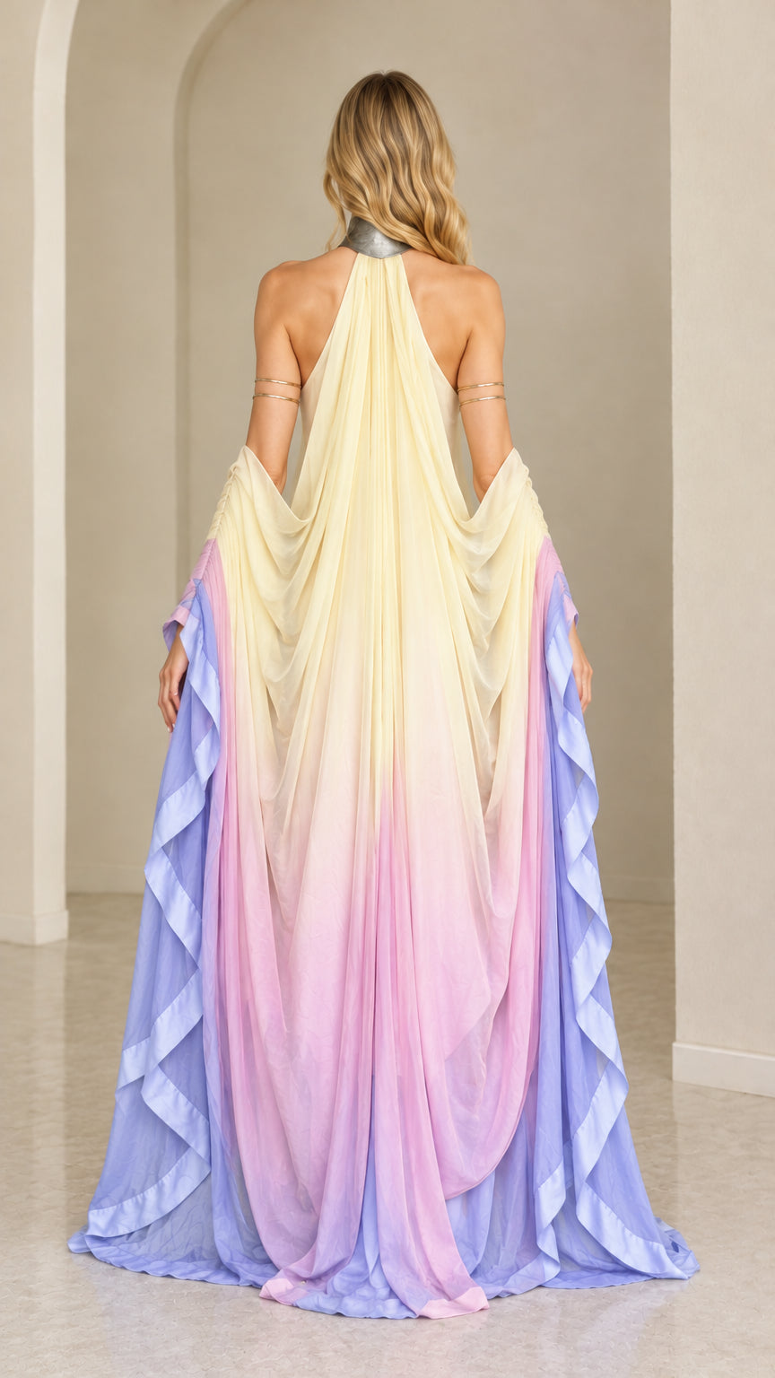 Back full view of pastel ombre halter maxi gown with sweeping gathered train