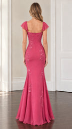 Back view of model in fuchsia evening gown featuring square back and flared skirt