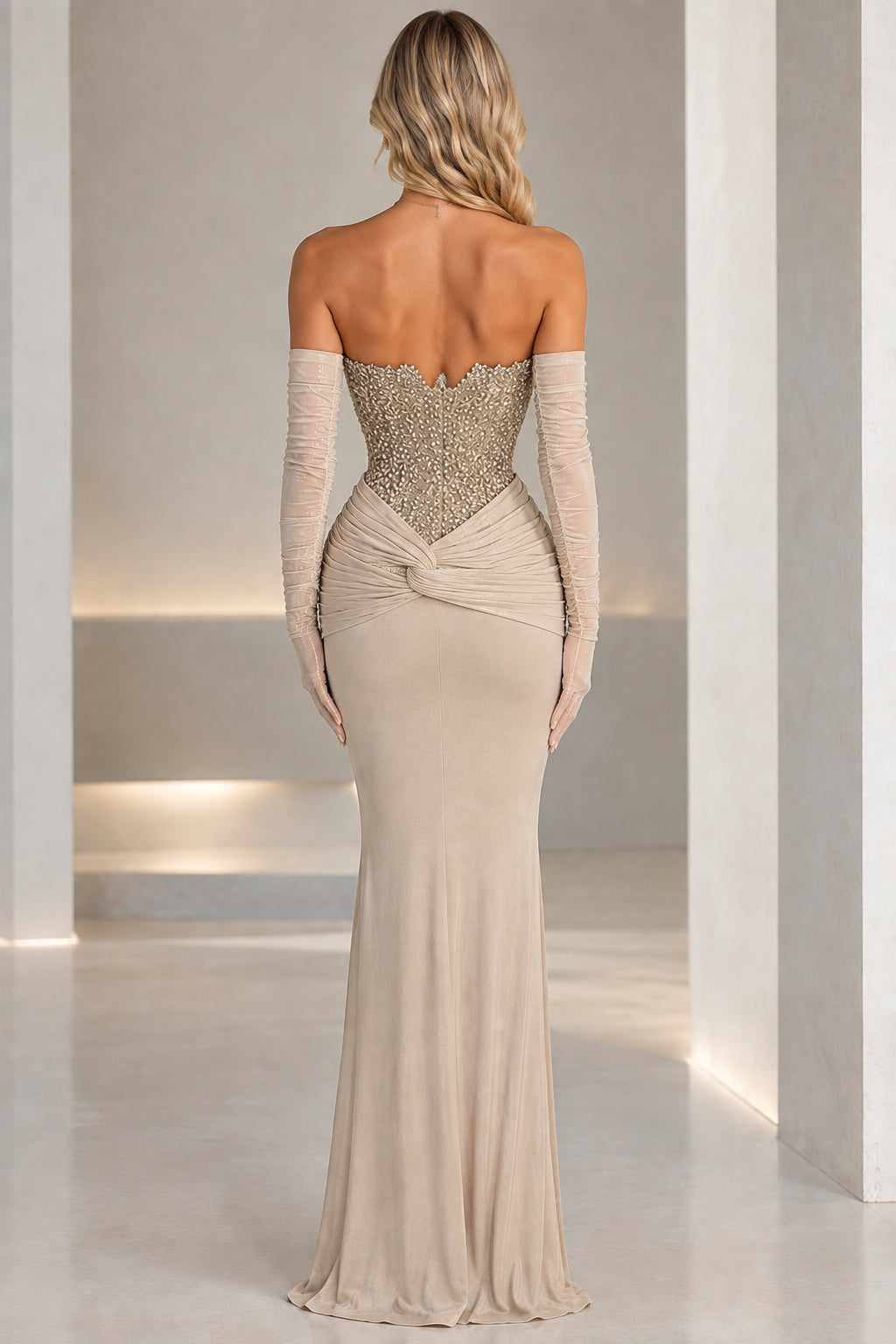 Champagne strapless evening dress with corset back detailing and opera gloves - rear view