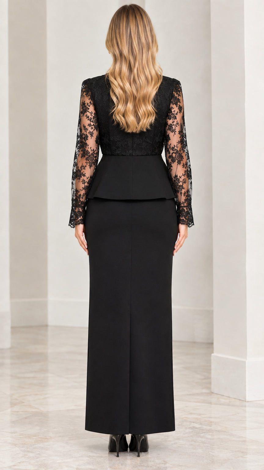 Back view of model in elegant black long sleeve lace formal two-piece set