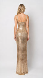Back view of model in gold sequin evening gown showing square backline